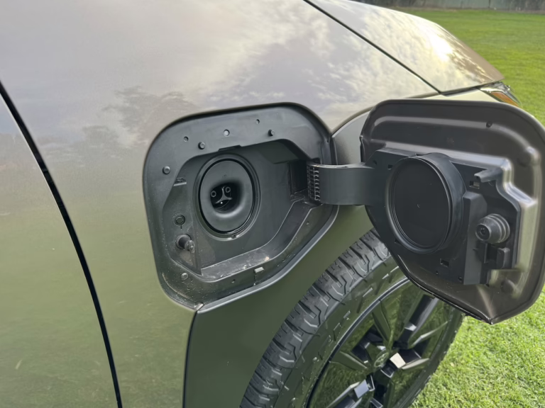 2026 Toyota bZ Woodland NACS charge port, mounted on the passenger front side.