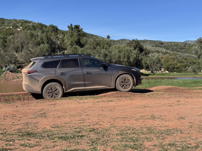 2026 Toyota bZ Woodland in profile, progressing over an uneven path