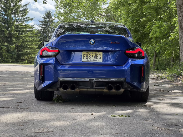2026 BMW M2 CS, portimao blue metallic, rear with quad-tip exhaust. Image by Robin Warner