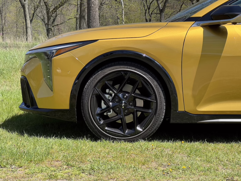 2026 Kia K4 hatchback GT Line Turbo, sparkling yellow, front wheel, 18-in. Image by Robin Warner