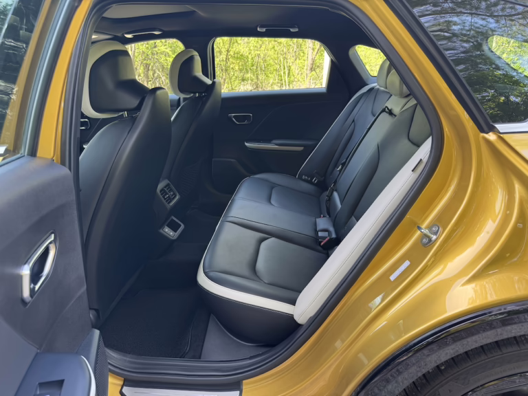 2026 Kia K4 hatchback GT Line Turbo, sparkling yellow, rear seat. Image by Robin Warner